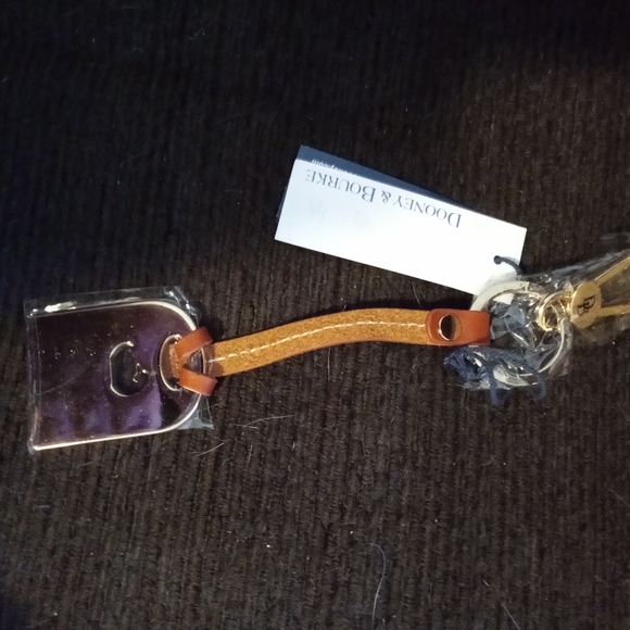 NWT DOONEY AND BOURKE HANGTAG - Picture 2 of 2